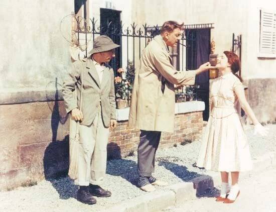 Jacques Tati (centre) in Mon oncle (1958; My Uncle, Mr. Hulot).