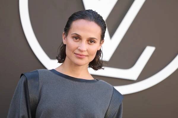PARIS, FRANCE - OCTOBER 01: (EDITORIAL USE ONLY - For Non-Editorial use please seek approval from Fashion House) Alicia Vikander attends the Louis Vuitton Paris Womenswear Spring-Summer 2025 show as part of Paris Fashion Week on October 01, 2024 in Paris, France. (Photo by Pascal Le Segretain/Getty Images)