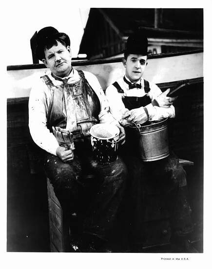 Fotografie Oliver Hardy And Stan Laurel In 'Towed In A Hole'