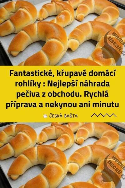 some bread rolls are sitting on a baking sheet