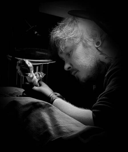 Chris Scott tattooing