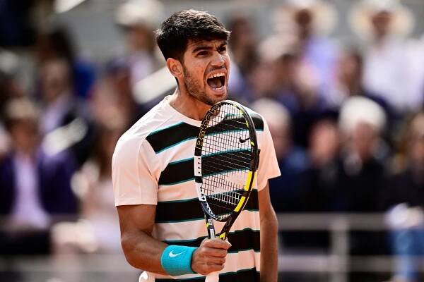 Carlos Alcaraz celebrating a win at the French Open.