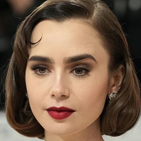 Lily Collins Somehow Managed to Make Milkmaid Braids Goth — See Photo