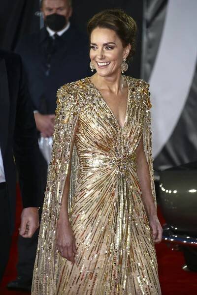 Image may contain Human Person Fashion Evening Dress Clothing Gown Apparel Robe and Premiere