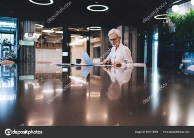 Focused Elderly Business Lady Glasses Working Project Using Laptop While