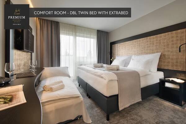 Postel nebo postele na pokoji v ubytování PREMIUM Wellness & Wine Hotel Znojmo