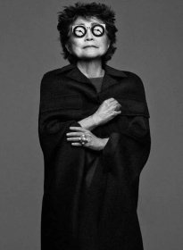 Yoko Ono Wearing Fun and Quirky Glasses Wallpaper