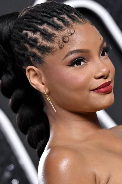Halle Bailey Is a Dead Ringer for Halle Berry in Her Bond-Girl Pixie Cut — See Photos