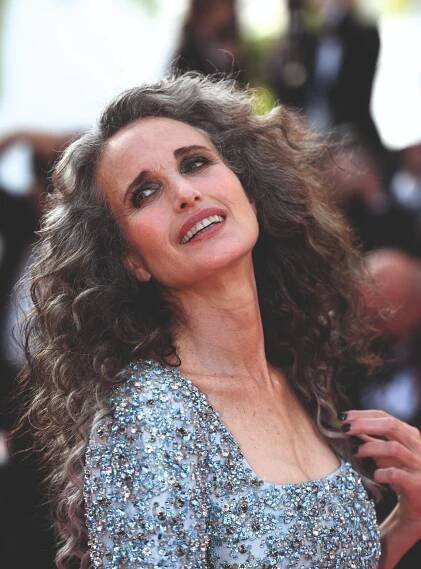 Andie MacDowell on the Cannes red carpet with gray hair