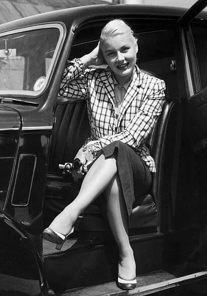 Image may contain Clothing Apparel Furniture Chair Human Person Footwear Shoe Vehicle and Transportation