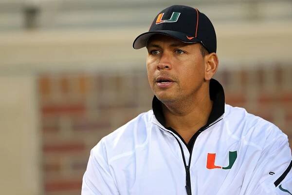 Alex Rodriguez watches the Miami-Florida State football game from the sidelines.
