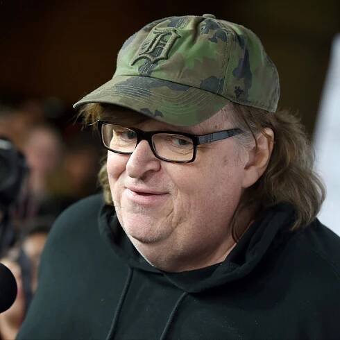 Michael Moore floats conspiracy theory that Trump may be faking Covid diagnosis