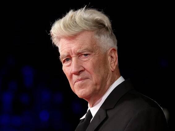 David Lynch in a black suit