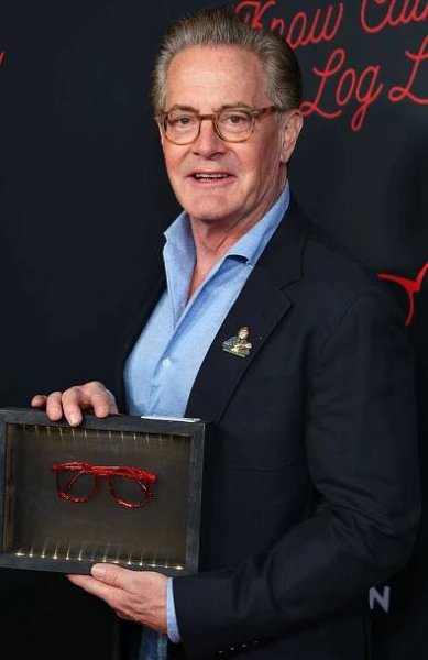 Kyle MacLachlan holds a pair of glasses worn by Catherine Coulson at American Cinematheque's This Is Not a Fiction 2025 Series closing night premiere of 