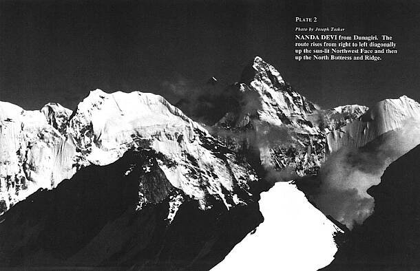 NANDA DEVI frp, Dimagiri.  The route rises from right to left diagonally up the sun-lit Northwest Face and then up the North Buttress and Ridge