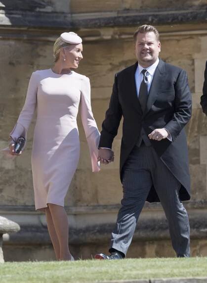 James Corden and his wife Julia pictured arriving at the wedding in the morning