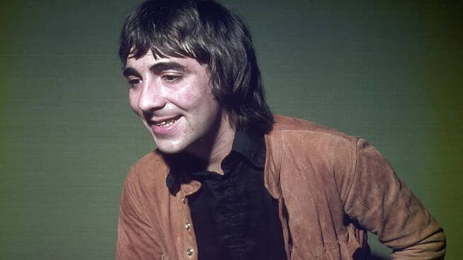 Keith Moon laughing and looking off