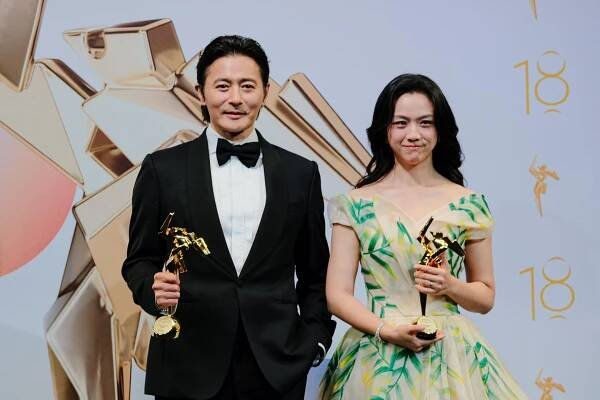 Jang Dong-gun and Tang Wei