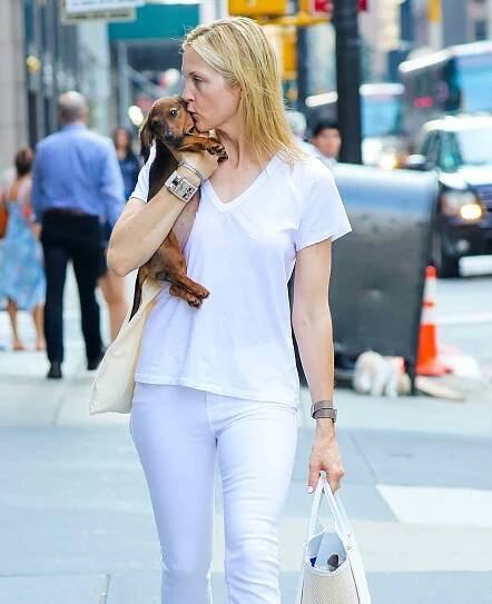 Kelly Rutherford is spotted carrying her puppy while strolling on Madison Avenue in New York City
