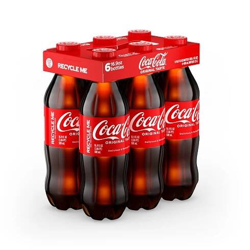 Digital twin of a Coca-Cola 6-pack featuring 16.9 fl oz (500 ml) plastic bottles. The bottles are packaged with a red top carrier displaying the Coca-Cola logo, 'Original Taste' branding, and the message 'Recycle Me.' Each bottle features a red label with the iconic Coca-Cola logo and the phrase 'Delicious & Refreshing,' emphasizing sustainability and classic appeal.