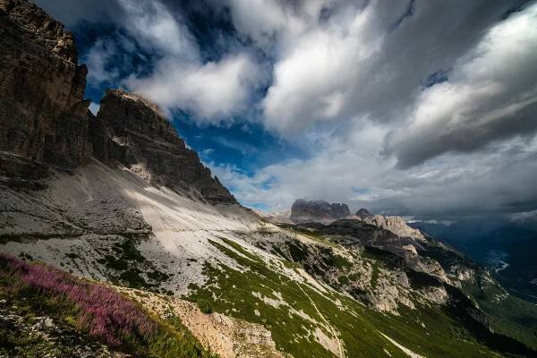 This is the view that we enjoyed from the Auronzo refuge, in the Dolomites, in Italy. There's a small lake on the right, the Auronzo di Cadore lake. The three peaks of Lavaredo on the left, a small church in the middle, and, unbelievable and never seen in my life a rainbow almost on the ground! The photo is made with the most extreme wide angle lens I ever used, and to give you an idea on how much is that wide, in the next posts I will show you some details of the same place taken with a 200mm.