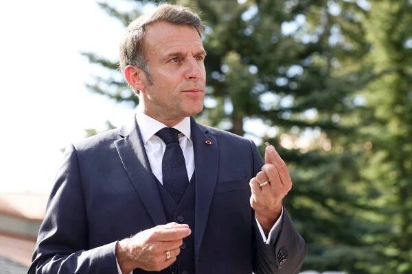 President Emmanuel Macron speaking to the press.