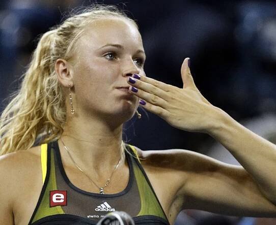 Wozniacká vyřadila Šarapovovou. Dál kráčí i Federer