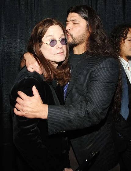 Ozzy Osbourne of Black Sabbath, inductee, and Robert Trujillo of Metallica 