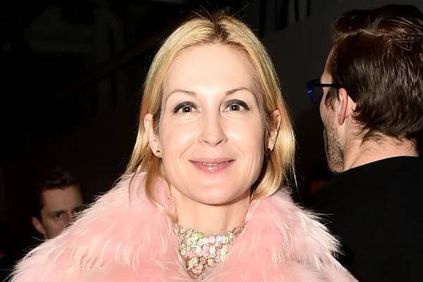 Kelly Rutherford poses with son Hermés in fashion magazine