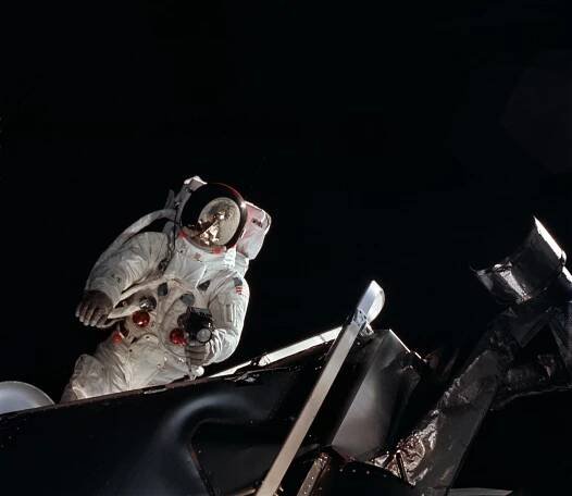NASA astronaut Russell L. Schweickart during a spacewalk in March 1969, as seen from inside the lunar module.
