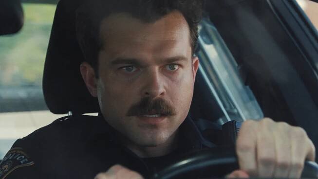 Alden Ehrenreich & 'Weapons' Team Resisted Cop Mustache At First