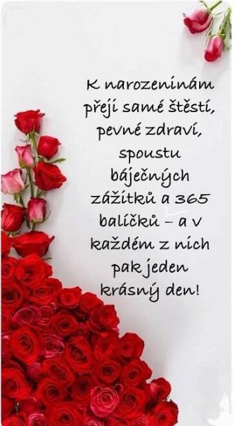 a bouquet of red roses sitting on top of a white sheet with the words happy valentine's day