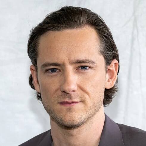 Lewis Pullman's hair - slicked back medium length hairstyle