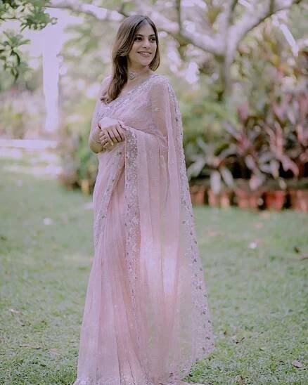 Santhi Mayadevi: 10 Dazzling Photos That Highlight Their Unique Style and Personality 18