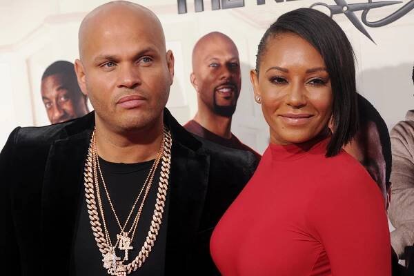 HOLLYWOOD, CALIFORNIA - APRIL 06: Mel B and husband Stephen Belafonte arrive at the premiere of New Line Cinema's 