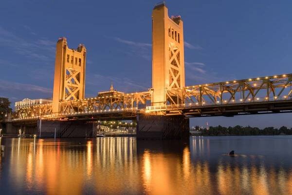 Tower Bridge And Lights Reflected On The Sacramento River. Sacra