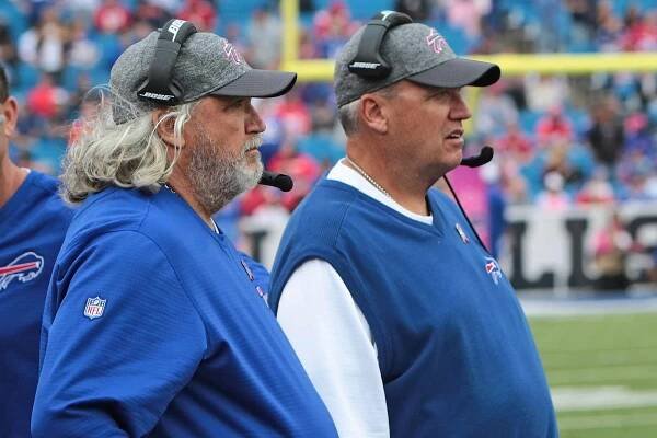 Head coach Rex Ryan of the Buffalo Bills and his brother coach Rob Ryan watch from the side lines during the second half against the San Francisco 49ers at New Era Field on October 16, 2016 in Buffalo, New York.