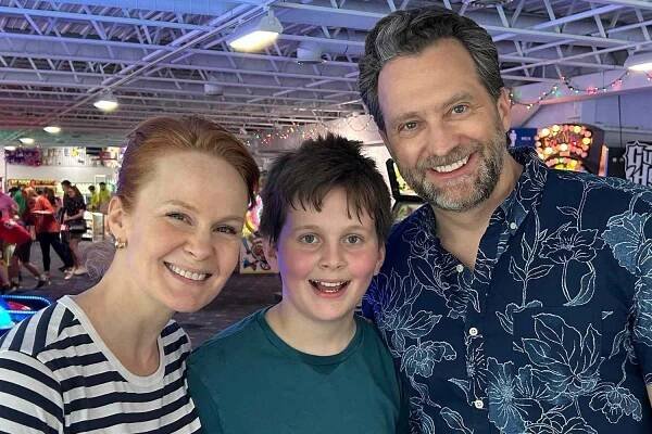 Kate Baldwin and husband Graham Rowat with their son Colin.