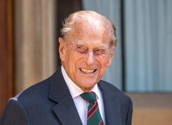 Prince Philip smiling in suit at royal engagement