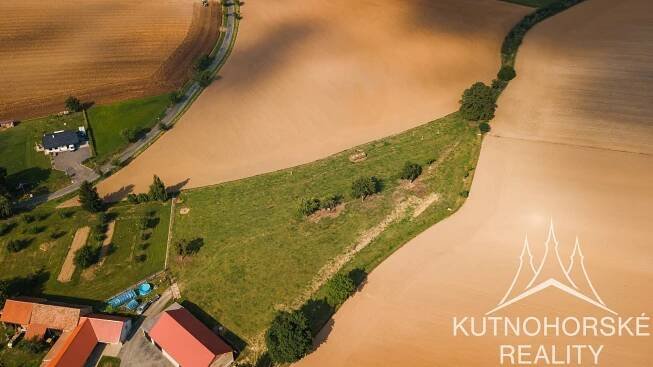 Prodej stavebního pozemku 1000 m², Suchdol - Malenovice