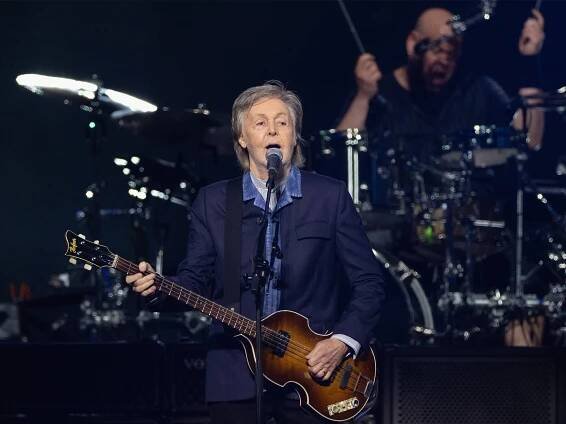 Paul McCartney playing bass and singing on his Got Back tour.