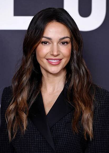 Michelle Keegan in a dark jacket at an event in 2023.