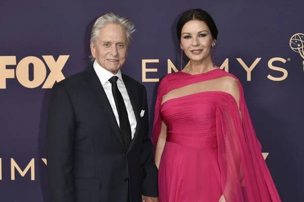 Michael Douglas a Catherine Zeta-Jonesová pobývají v Londýně v královském paláci