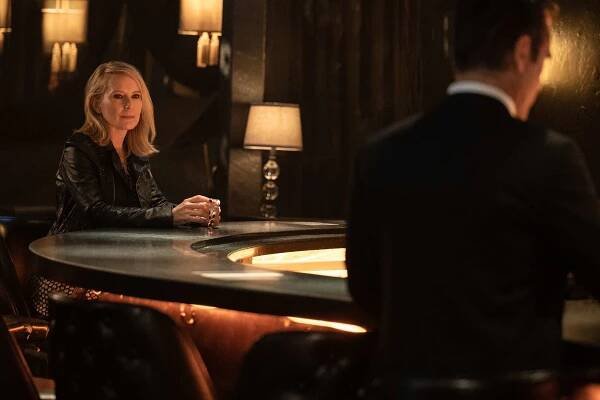 Episode 1. Amy Ryan and Colin Farrell in "Sugar," premiering April 5, 2024 on Apple TV+.