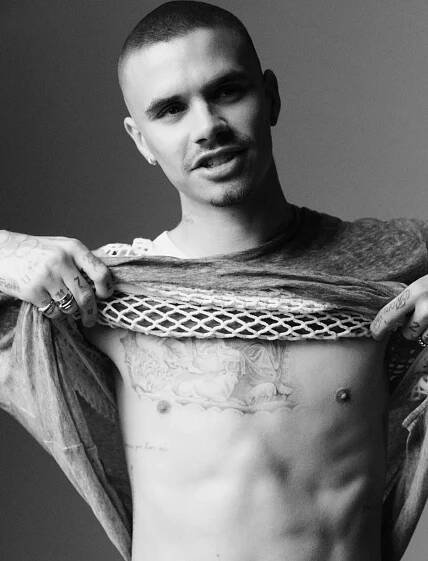 Romeo Beckham spitting image of dad David as he strips off for magazine shoot