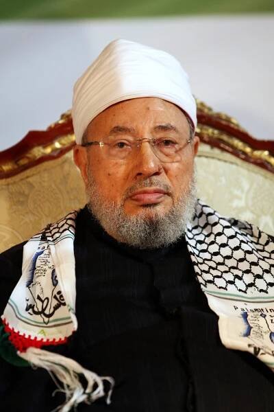 Qatar's Egyptian-born cleric Sheikh Youssef al-Qaradawi attends a protest against Israel in Doha