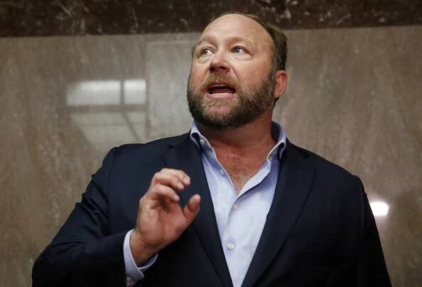 Alex Jones, Louis Farrakhan, others banned from Facebook and Instagram