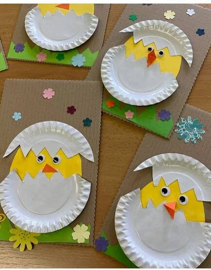 four paper plates with chicks on them