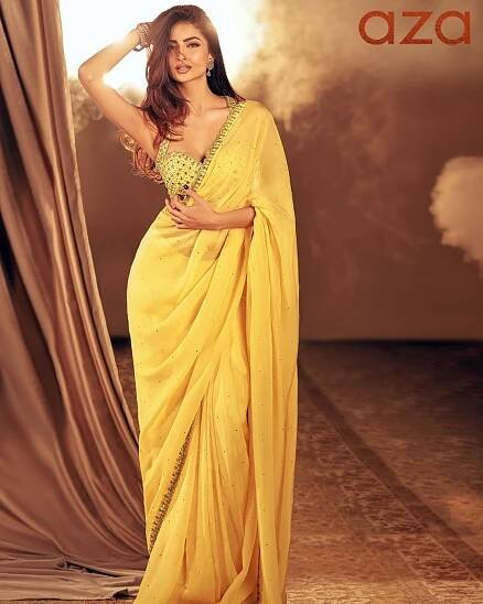 Palak Tiwari in Yellow Viscose Organza Pre-draped Saree With Halter Neck Blouse
