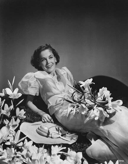 Actress Maureen O'Sullivan With Lilies